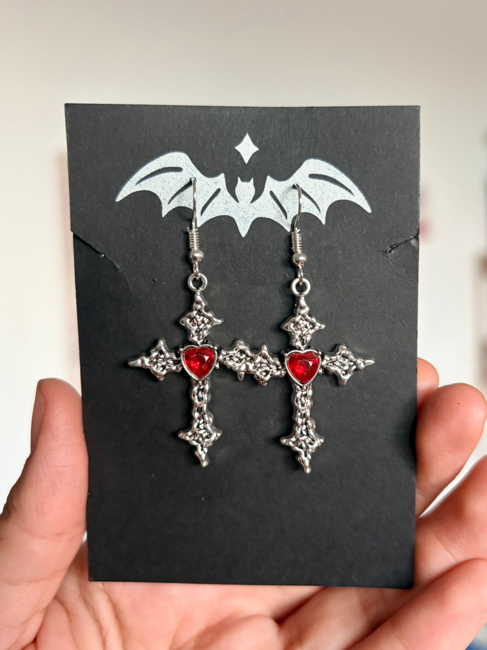 Aretes Cruz con Corazón